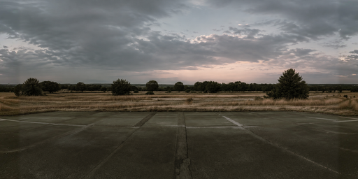 Gray Overcast Dusk Over Empty Concrete Lot HDRI Sphere preview showing a 360-degree HDRI environment sphere