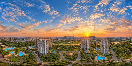 Amber-pink Sunset City Skyline Under Scattered Clouds HDRI Sphere preview showing a 360-degree HDRI environment sphere